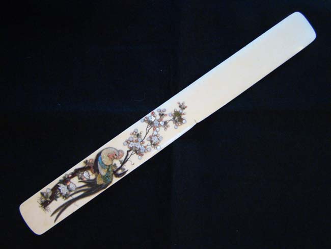 A late 19th century Chinese Ivory Page Turner with Mother-of Pearl and other inlays